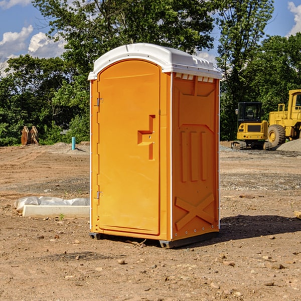 how often are the porta potties cleaned and serviced during a rental period in Samburg